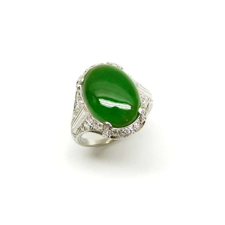 Oval cabochon jade and diamond ring